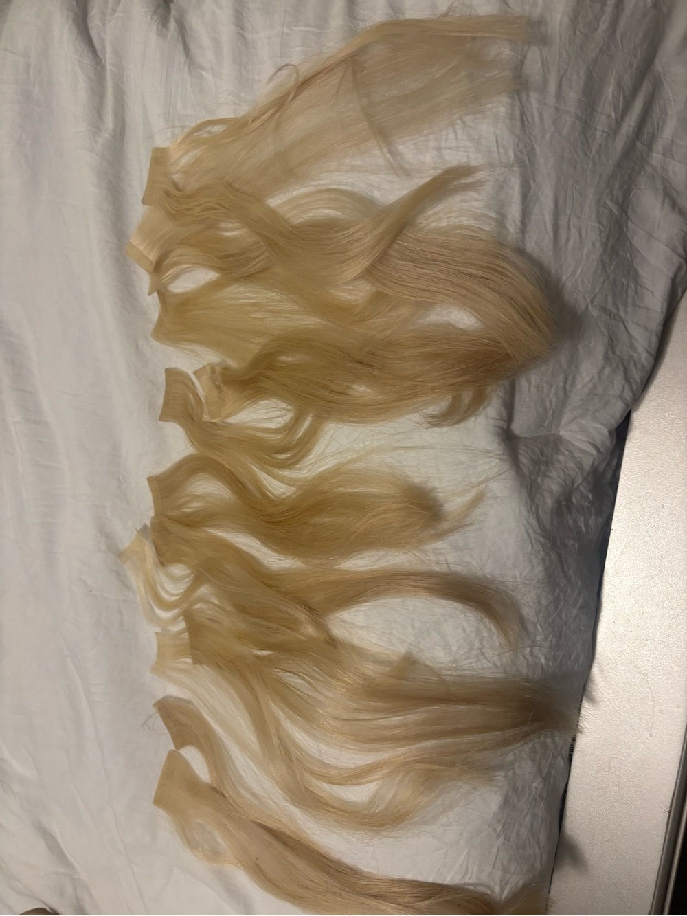 Human hair platinum blonde 18 inches tape in extensions paid over $700. Jus